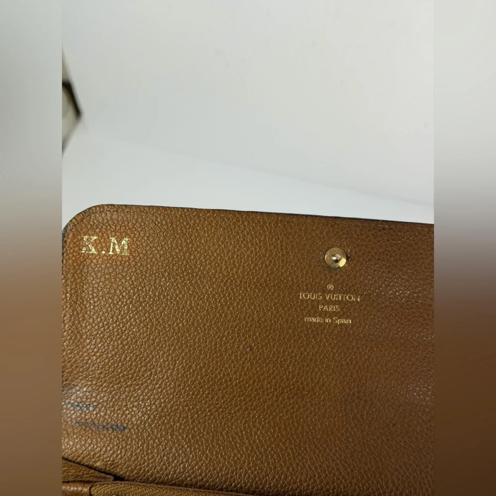 Louis Vuitton Virtuose Wallet Crafted Brown Monogram Empreinte Leather